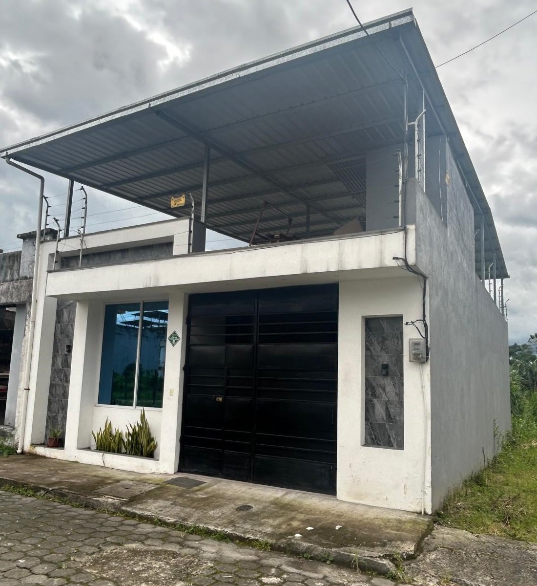 casa en venta coop chiguilpe santo domingo con terraza techada y planos aprobados para ampliacion Ecuador oferta