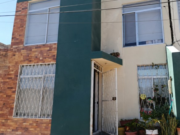casa en venta en San Antonio de Pichincha fachada conjunto Suprirosa